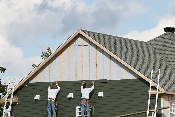 Professional Siding Contractor technician working in Clinton, IN